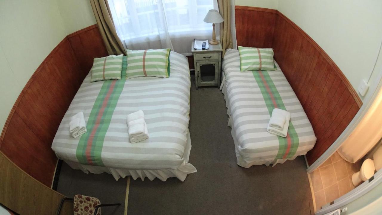 Hostal Y Cabanas Ainil ปุนตาอาเรนาส ภายนอก รูปภาพ